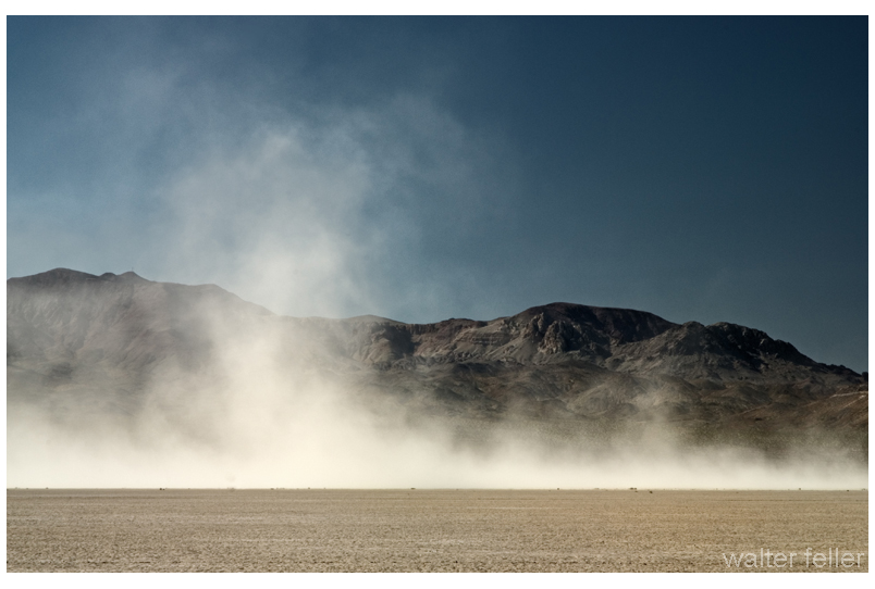 Dust storm kicks up at the dry lake bed.